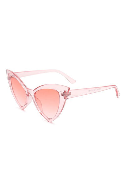 angular cat-eye plastic frame sunglasses in translucent pink with a gradient pink lens, shown 3/4 view