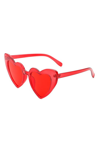angular cat eye "Lolita" heart-shaped sunglasses in a bright translucent red with red lens, shown 3/4 view