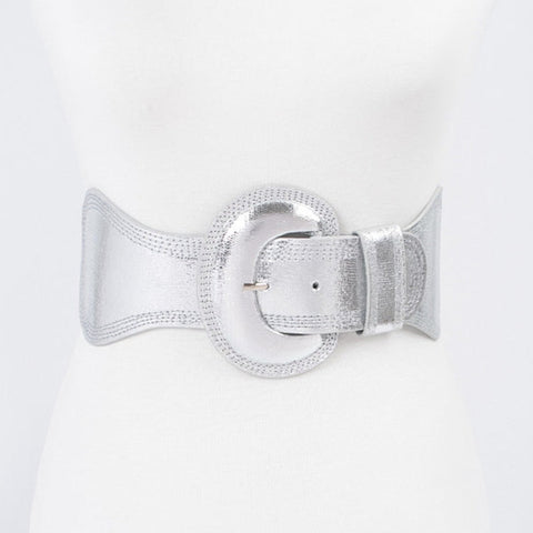 Shiny metallic silver elastic waist belt with self angled buckle. Shown from front