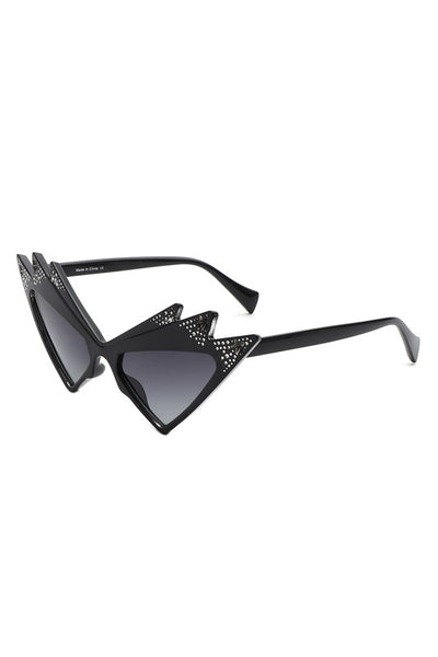 A pair of shiny black ultra geometric cat eye sunglasses with three points at the top of each eye and stamped in mock rhinestones, silver stars, and black gradient lenses, shown 3/4 view