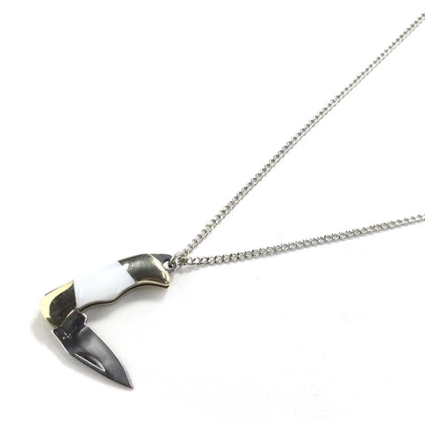 18" silver metal delicate oval link chain necklace with a teeny-tiny stainless steel and brass pocket knife pendant with white pearl handle. showing close up of knife partially open