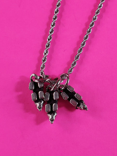 Three small American pewter charms in the shape of a rat hanging from a stainless steel rope chain, showing back of charms view