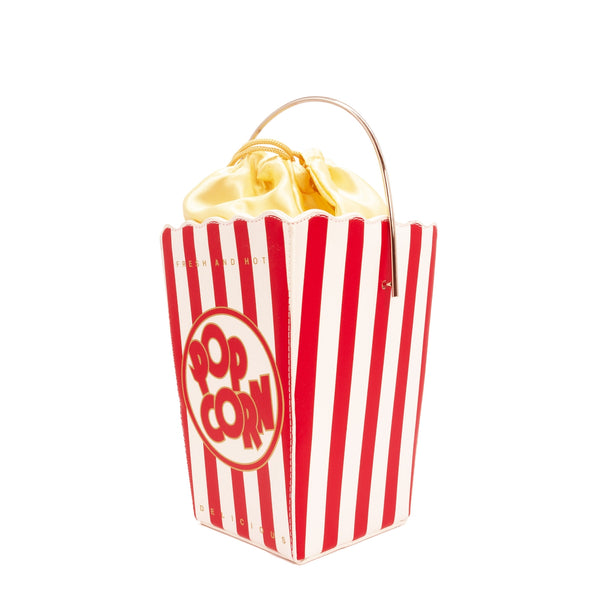 Novelty purse in the shape of a box of red and white striped popcorn. Shown from side