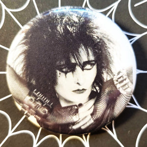 2.25” pinback button of black and white photo of Siouxsie Sioux