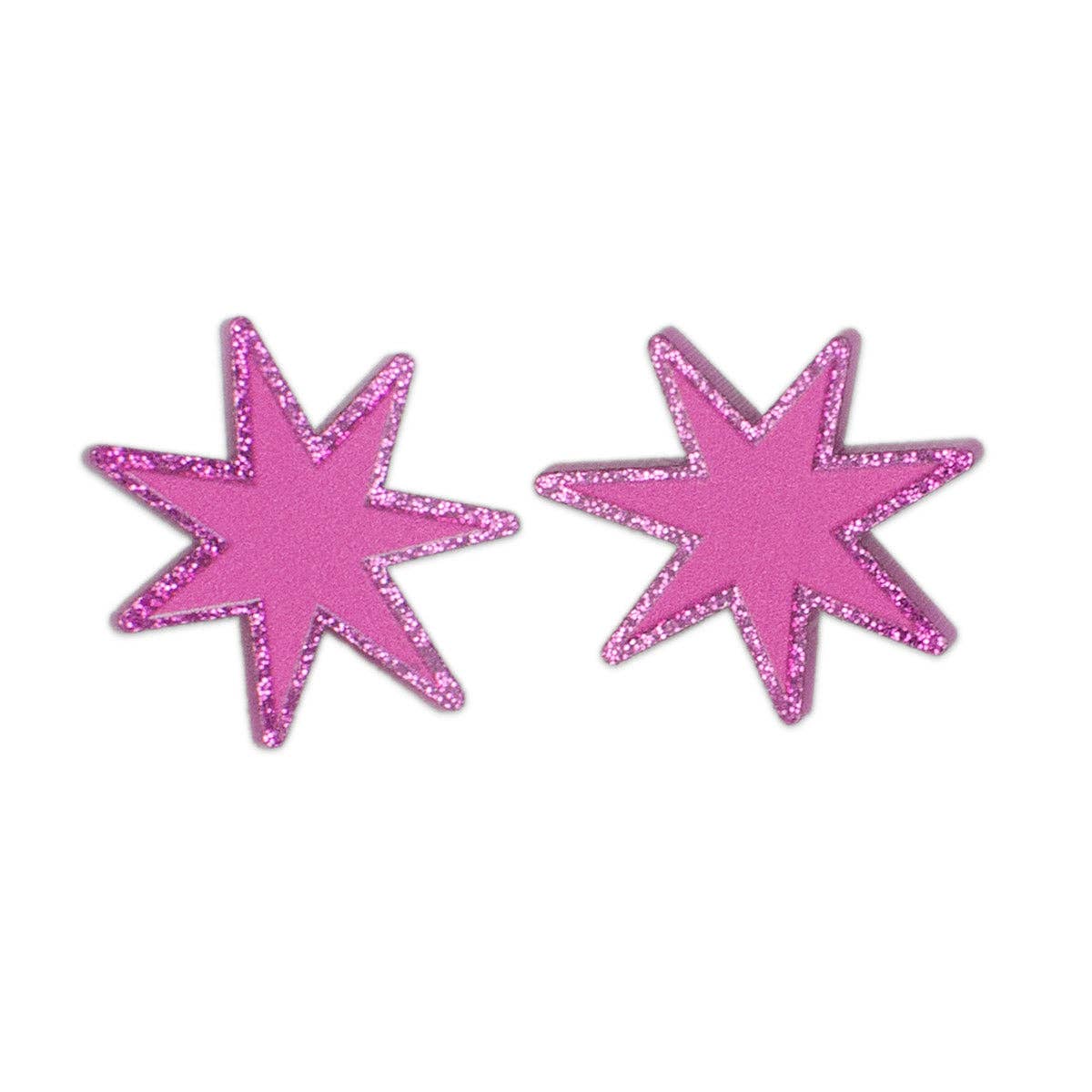 magenta laser-cut acrylic starburst post earrings with a matching glitter border. Shown from front