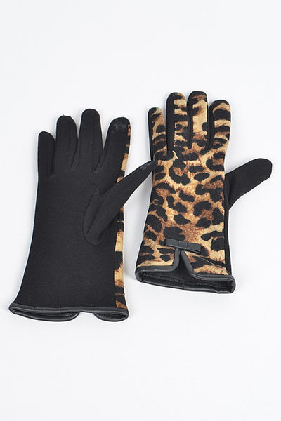 pair fleece lined ponte knit gloves with leopard print tops finished with black faux leather piping trim and bow detail at the notched cuff