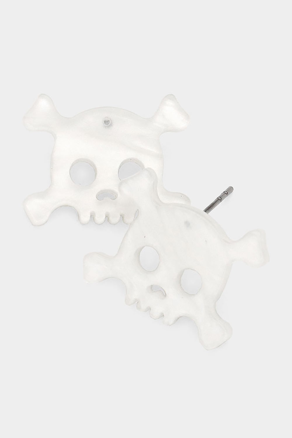 pair of stylized skull and crossbones post earrings in pearly off-white acrylic resin