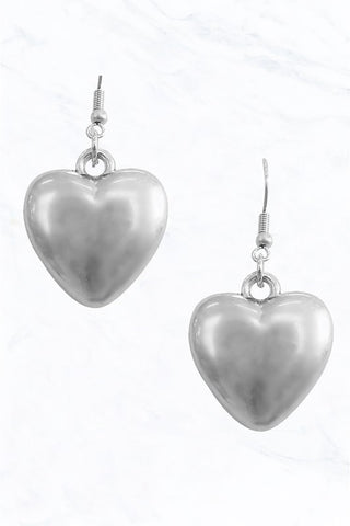 1" burnished silver metal puffy heart earrings on silver metal fishhook hardware.