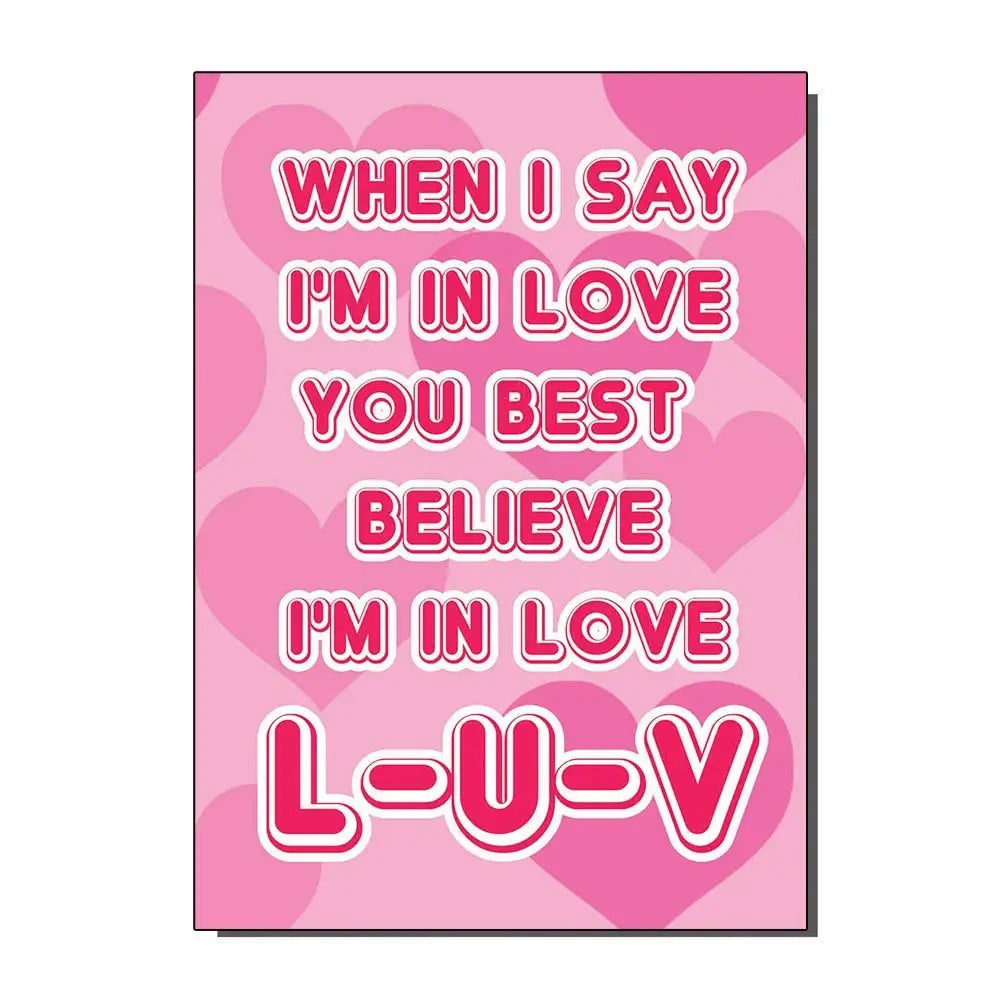 A note card with a pink heart background and the message “When I say I’m in love you best believe I’m in love L-U-V” in white and pink bubble lettering