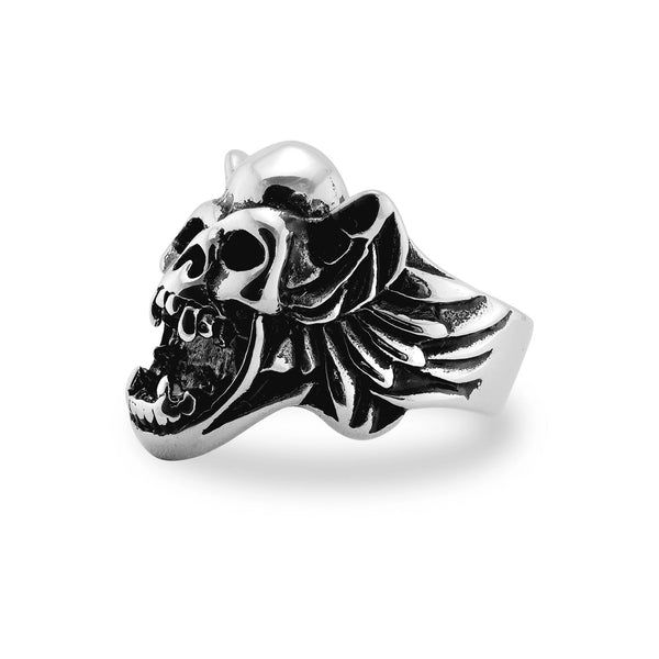 Shiny stainless steel ring depicting a goblin skull with an open mouth. Seen from the side