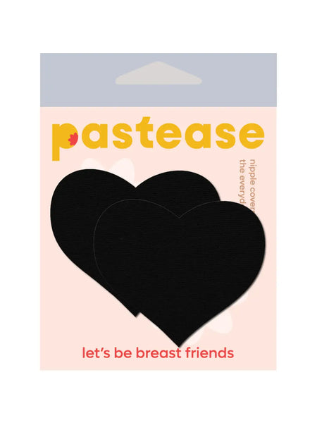 Black heart shaped pasties shown in their packaging 
