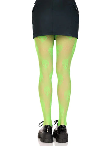 Neon green fishnet tights with all-over knit-in alien head pattern. Shown on a model wearing shoes from the back