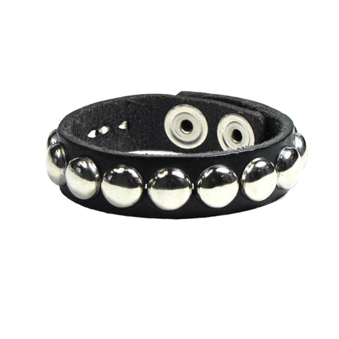 Black leather 3/4” wide adjustable studded cuff with a single row of 1/2" silver metal dome studs and double heavy duty silver metal snap closure. Shown closed