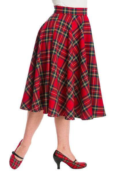 Red plaid circle skirt worn by model. Shown from side