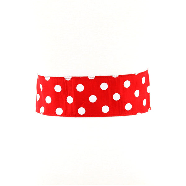 Red and white polka dot cotton waist belt with rectangular self buckle. Shown done up from the back on a dress form