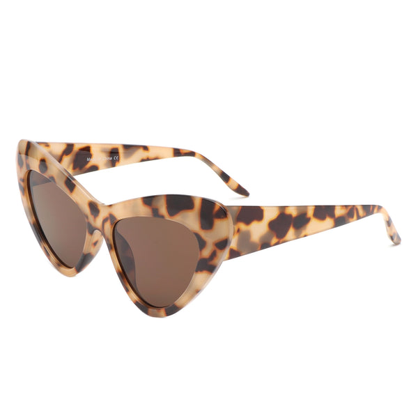 Light brown tortoiseshell plastic rounded cat eye sunglasses with a curved bevel detail at each temple and dark brown lenses. Shown from side