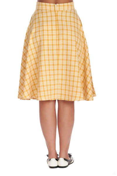 High waisted creamy white and yellow plaid swing skirt ending just below the knee. Shown from back