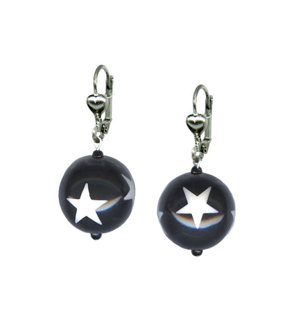 Lever back dangle earrings with a black ball-shaped charm decorated with white stars 