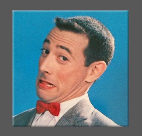 Square magnet with color portrait of Pee-Wee Herman on a bright blue background 