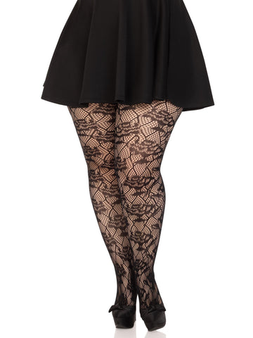 Plus size model wearing black net tights with a rose and diamond knit in pattern. Shown from front
