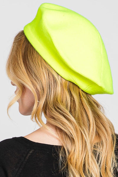 French style acrylic beret in neon yellow, shown on a model
