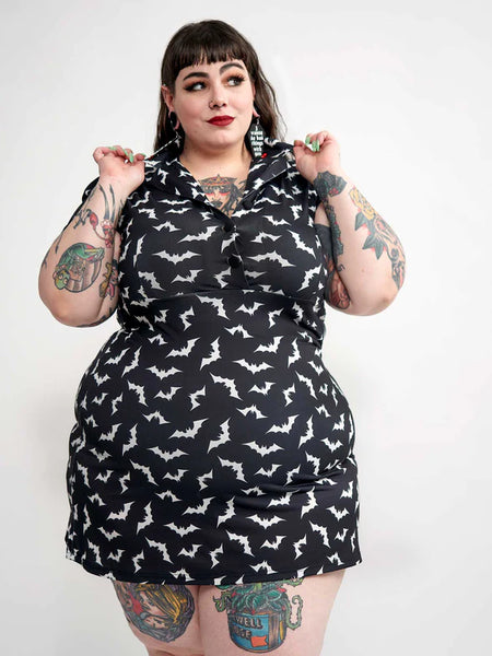 black with allover white bats print short sleeve collared Rosie Dress three button closure bodice, above the knee length a-line silhouette, shown on model