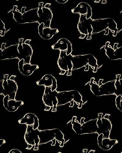cream print repeat pattern of dachshunds against a black background