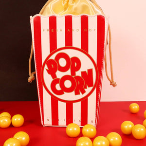 Novelty purse in the shape of a box of red and white striped popcorn