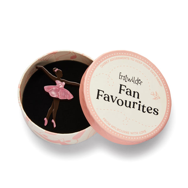 "Ballet Russes" dark brown colored ballerina in a pink tutu layered resin brooch, shown in illustrated round box packaging