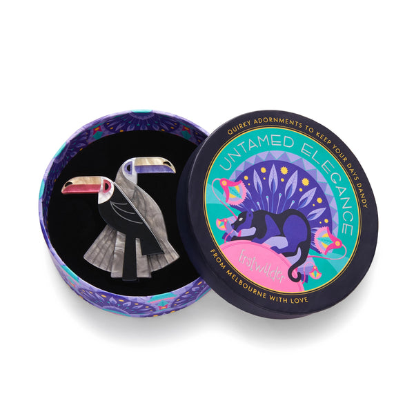 Untamed Elegance Collection "Toucan Tango" Art Deco inspired layered resin brooch, shown in illustrated round box packaging