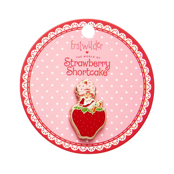 "Sitting on a Strawberry" Strawberry Shortcake character enameled gold metal clutch back pin, shown on illustrated backer card packaging