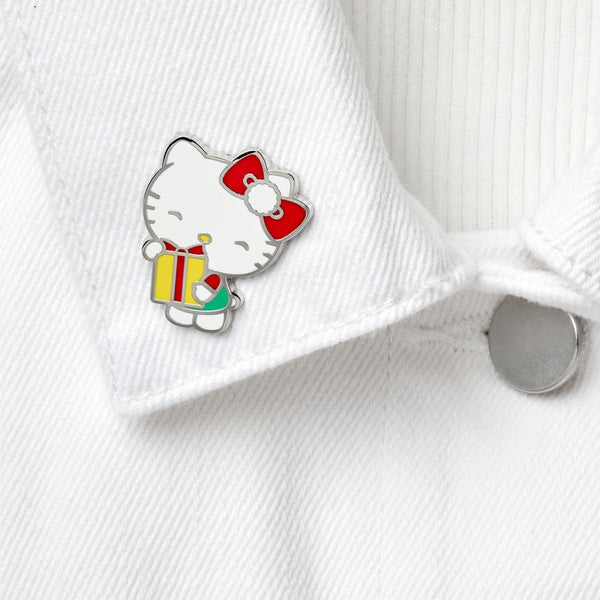 Hello Kitty Christmas Collection "A Present for You!" Hello Kitty holding a yellow wrapped present, shown worn on a white denim jacket