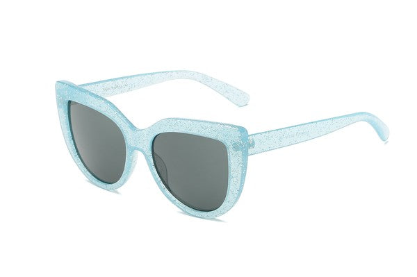 Thick glitter infused translucent light blue plastic frame cat eye sunglasses with smoke lens, shown 3/4 view
