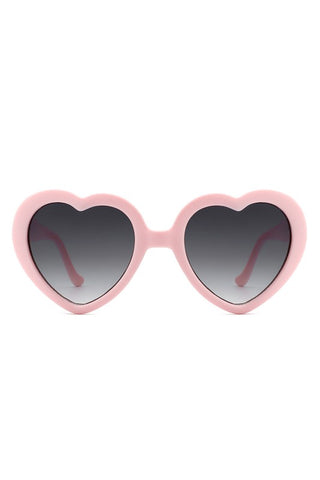 Pale pink plastic frame heart-shaped sunglasses with gradient smoke lenses