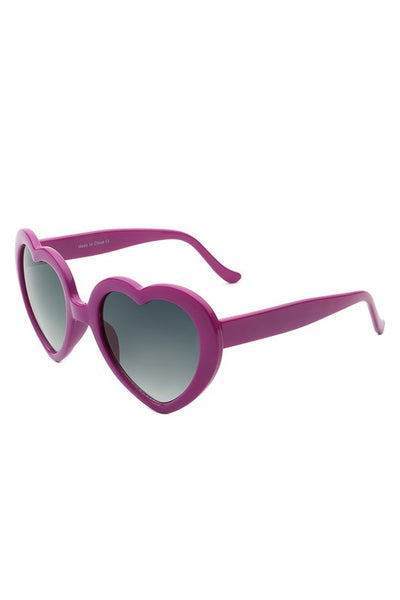 Purple plastic frame heart-shaped sunglasses with gradient smoke lenses, shown 3/4 view