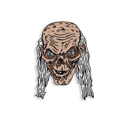 brown, white, and blue enameled enameled black metal Crypt Keeper tv show host portrait lapel pin