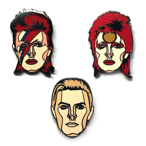 set of three David Bowie portrait enameled metal pins, each depicting a different era persona