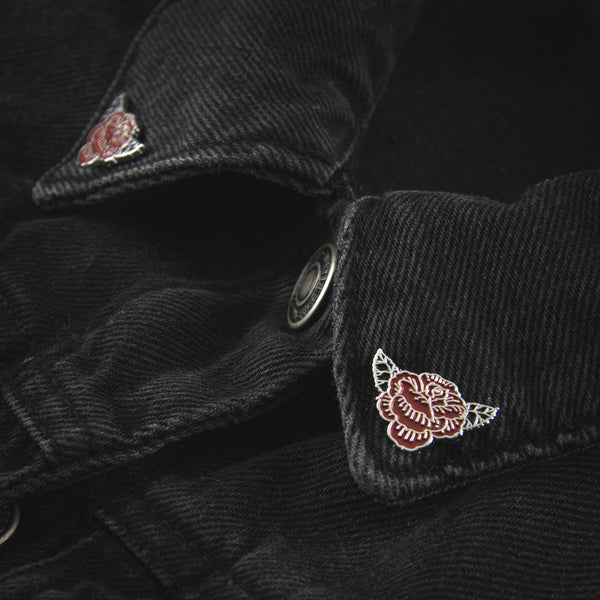 red rose bloom with two leaves enameled silver metal clutch-back pin set, shown on denim jacket collar