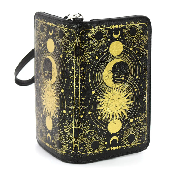 textured black faux leather with metallic gold sun, moon, and stars Celestial-themed print book-shaped wallet