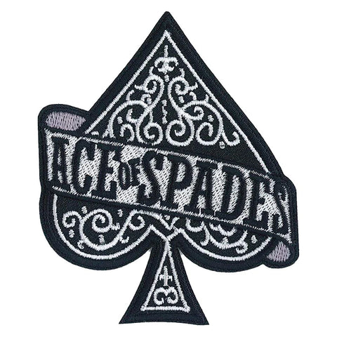 A black, white, and grey embroidered patch in the shape of a spade decorated with the title “ACE OF SPADES”. 