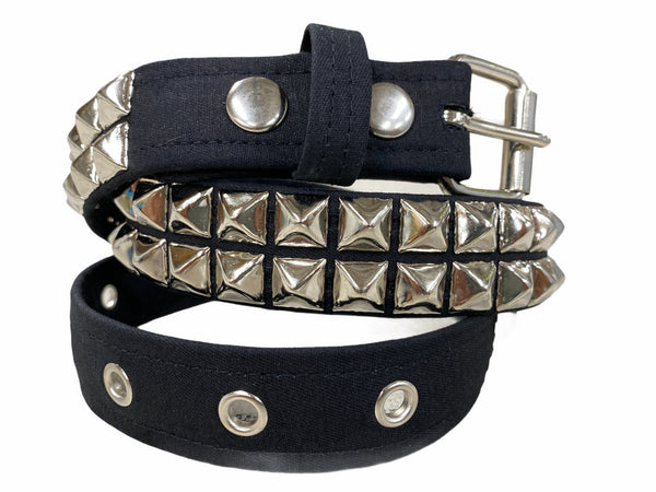 1/4” wide canvas belt in classic black with 2 rows of 1/2" silver metal pyramid studs. Seen wrapped 