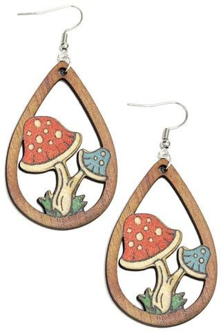 Teardrop shaped wooden dangle earrings with cartoony red and blue mushrooms sprouting from their middles