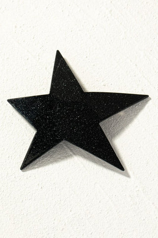 shiny black glitter star shaped barrette with a sturdy pinch clip fastener