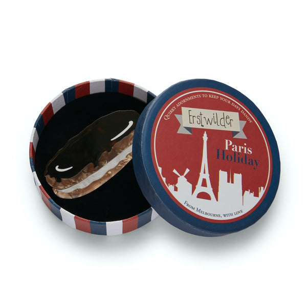 Paris Holiday Collection "Éclair Au Chocolat" layered resin brooch, shown in illustrated round box packaging