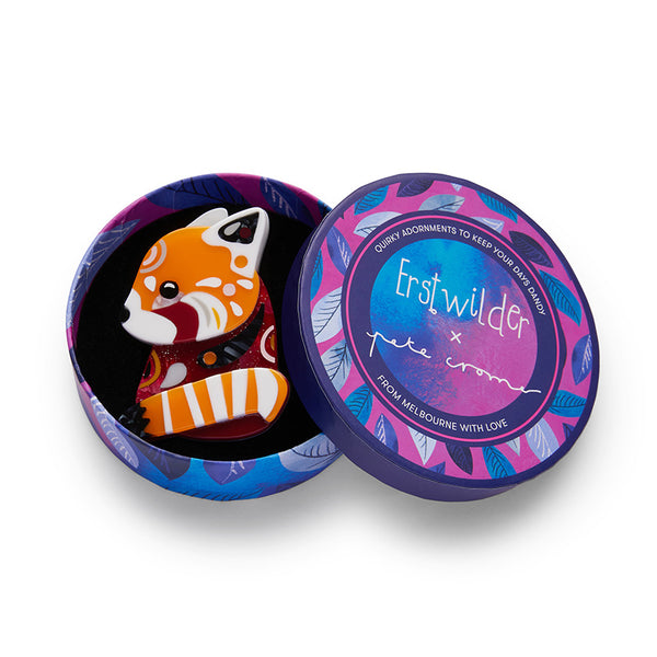 artist Pete Cromer x Erstwilder Wildlife Collaboration Collection "The Rakish Red Panda" orange, brown, black, and white layered resin mini brooch, shown in illustrated round box packaging