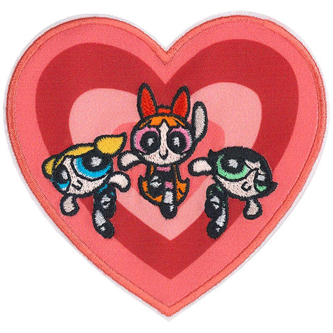 embroidered patch of The Powerpuff Girls in fighting stance in front of a pink and red heart
