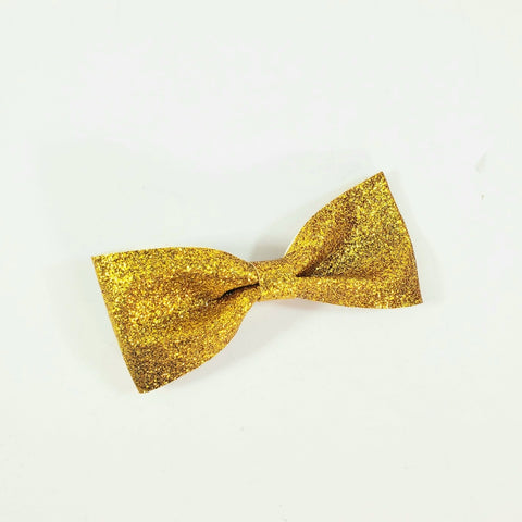 image_131383 5/8" x 1 5/8"  bow hair clip in shimmery gold glitter encrusted stiff fabric on 2 1/8" gator clip fastener