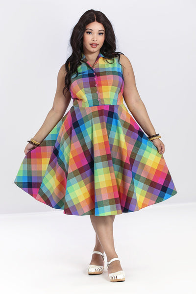 rainbow check plaid dress features a fitted sleeveless bodice with pink button closure and wide pointed collar, and full just-below-the-knee length skirt, shown on model
