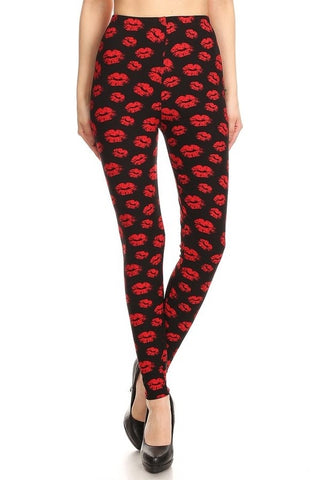 high-waisted brushed fiber stretch knit black leggings with allover red lipstick kiss print, shown on model