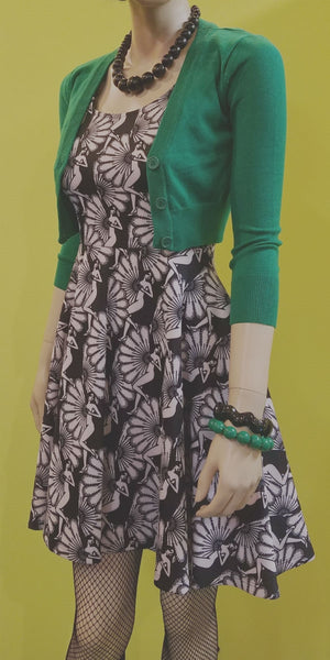 cropped length  3/4 sleeve 3-button v-neck cardigan in kelly green, shown styled on mannequin